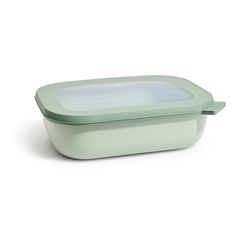 a green container with a white lid