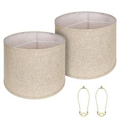 two lampshades with one light on each side and the other in between them