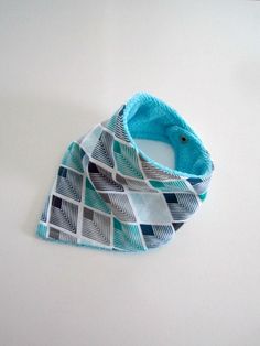 "This PDF Sewing Tutorial with Pattern guides you step-by-step with photo and written instructions in making your own Bandana Style Baby Bib with a Snap Dome Closure. Size: 6 months - 36 months Neck Circumference: 28cm / 11\" Chin to Chest: 16cm / 6.3\" *Please note: Not strictly following the 1/4\" seam allowance where mentioned will reduce the neck circumference in size* *YOU ARE NOT PURCHASING A FINISHED BIB* This PDF, Instant Download File Includes:  - Full Size Pattern Piece (Simply Print, Cut and Sew)  - Fabric and Materials List  - Step-by-Step Photo Instructions  - Step-by-Step Written Instructions  - Language: UK English *Other closure options can be used e.g. velcro or sew on domes etc however, it is recommended you stay true to the placement directions given within the tutorial Toddler Bibs Pattern, Etsy Tutorial, Toddler Patterns, Bandana Style, Pouch Sewing, Toddler Bibs, Bib Pattern, Baby Bandana Bibs, Bandana Styles