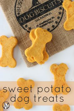 small dog treats sitting on top of a white table next to a bag with the words sweet potato dog treats