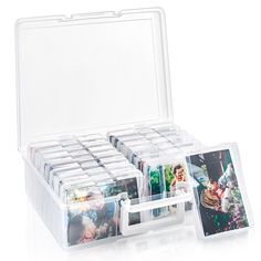 an open plastic box with pictures in it