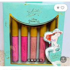 the disney princess lip glosses are in their packaging