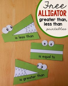 three alligator paper cutouts with the words free and greater than one is equal to another