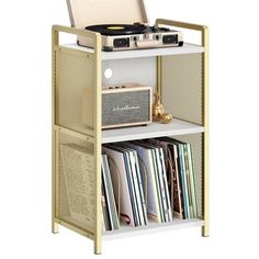 an old record player is sitting on top of a shelf with vinyl records and cd's