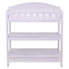 a white baby changing table with two shelves on each side and one shelf below it