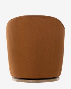 a brown chair sitting on top of a wooden table