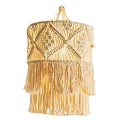 a chandelier hanging from the ceiling with fringes and beads in gold color