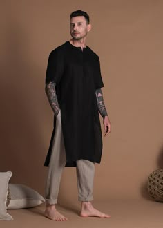 "A long linen shirt for men is made from lightweight linen to stay cool during summer. This tunic shirt is available in various colors. 🌿 DETAILS: - Regular fit men's tunic shirt - High side slits - Split neckline - Short sleeves - 100% Natural linen in lightweight weight (125gr/m2) - Wide color palette, color shown is BLACK 🌿 SIZING & FIT Please check OUR SIZE CHART carefully before you order. Feel free to contact me if you need advice on picking the right size or if you have any questions - Tunic Tops Men, Tunic Designs Men, Male Tunic Fashion, Fat Boys Fashion Men, Linen Clothes Men, Tunic Men, Tunic For Men, Mens Linen Shirts Casual, Zen Clothing