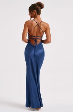 If you are looking for a super soft. romantic silhouette that skims over the body and enhances your figure. meet the Isobel maxi. Made from our silky soft satin with a bias cut. Isobel features a plunge neck. super low back with tie straps and a thigh high split.   Colour: Navy. Non stretch bias cut satin. Thigh high split. Plunge v-neck. Hugs the figure. Super low back with tie straps. Maxi length. Model is an XS and is wearing an XS. Homecoming Dresses Corset, Lattice Dress, Midi Dress Wedding Guest, Maxi Dress Sale, Into The Night, Sparkle Dress, Maxi Dress Navy, Satin Gown, Out Back