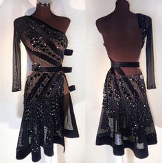 the dress is black and has gold sequins on it