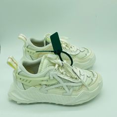 Mounted On A Rigged Rubber Sole, The Odsy Sneaker Is Updated With Tone On Tone Detailing Signature Doble Arrows At The Sidewalls And Contrast Zip Ties. Off White Shoes, Tone On Tone, Zip Ties, White White, White Sneakers, Womens Shoes Sneakers, Rubber Sole, Shoes Sneakers, Size 7