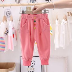 Girls Bottons Casual Pocket Pants Wholesale Clothing For Girls - PrettyKid Playful Pink Cotton Leggings, Playful Pink Bottoms With Pockets, Cute Pink Pants With Pockets, Playful Pink Cotton Pants, Pink Cotton Pants For Playtime, Pink Cotton Playwear Pants, Pink Cotton Pants For Playwear, Pink Bottoms For Playwear, Pink Playwear Bottoms