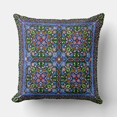 a decorative pillow with an intricate design on it