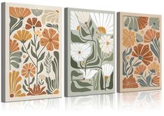 three canvases with flowers on them in different colors and sizes, one is green, the other is orange