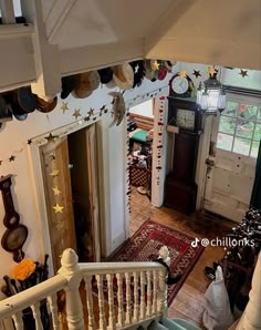 the stairs are decorated with stars and garlands on them, along with other decorations