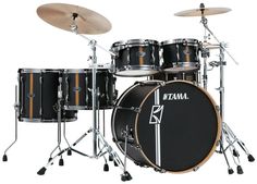 a drum set with two drums and one cymbal on the front, sitting in front of a white background