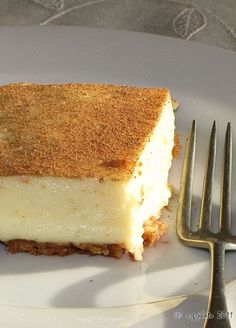 a piece of cheesecake on a plate with a fork