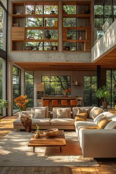 a living room filled with lots of furniture next to a tall window covered in windows