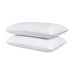 two white pillows sitting on top of each other