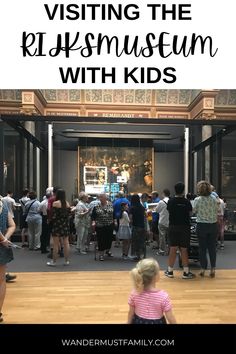 people standing in line at the museum with text overlay reading visiting the reiksmusum with kids