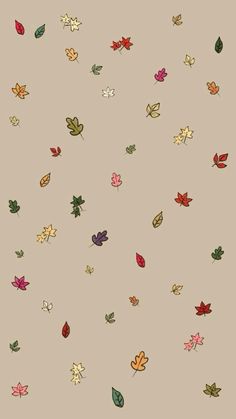 many different colored leaves are flying in the air on a light gray background with small white dots