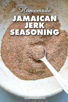 homemade jamaican jerk seasoning in a bowl with a spoon on the side and text overlay reading homemade jamaican jerk seasoning