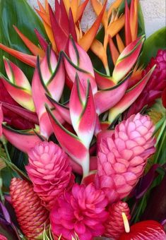 a bunch of flowers that are sitting on a table