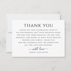 a thank card with the words'thank you'written in cursive writing