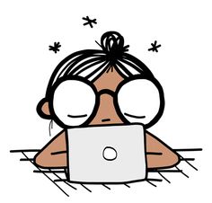 a woman with glasses is looking at her laptop