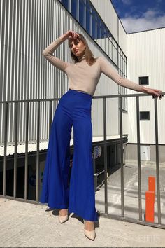 Electric Blue Jeans Outfit, Outfits With Bright Blue Pants, Royal Blue Clothes Color Combos, Electric Blue Trousers Outfit, Blue Office Pants Outfit, Royal Blue Trousers Outfit Women, Royal Blue Slacks Outfit Women, Royal Blue Jeans Outfit, Bright Blue Jeans Outfit