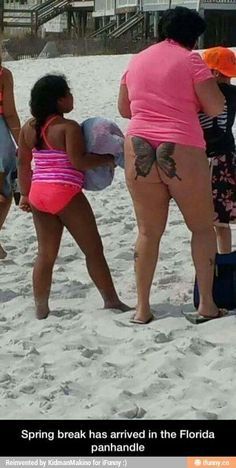 several women in bathing suits on the beach