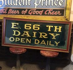 a sign for the restaurant called e 66th dairy open daily