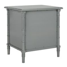 a small grey cabinet with metal legs on an isolated white background