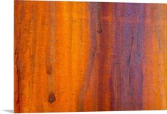 an orange, purple and yellow wood texture