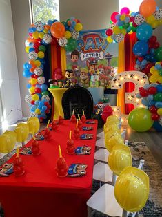 a birthday party with balloons and decorations