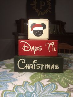 two wooden blocks that say days 11 and christmas