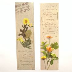 two bookmarks with flowers and leaves on them