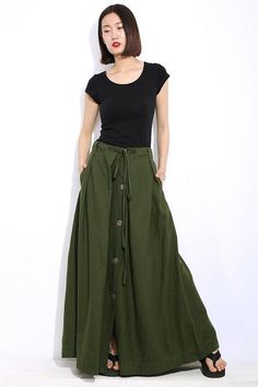 The Buttoned Linen Skirt is closed by the front buttons, the waist string also can adjust the waistband. The full length skirt is made of soft linen blend. The linen skirt has two side pockets. This casual everyday army green buttoned linen skirt is a lovely spring or summer basic that can be worn Army Green Skirt, Long Linen Skirt, Outstanding Outfits, Maxi Skirts Summer, Sukienki Plus Size, Skirts Long, Maxi Rok, Rock Outfit, Womens Skirts