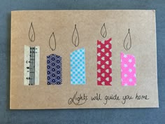 a piece of craft paper with different colored tape on it that says lights will guide you home