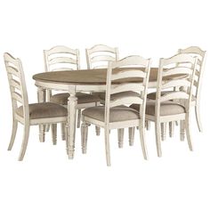 a dining room table and chairs with white finish