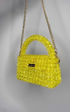 KNITKOS BAG yellow, crossbody bag, shoulder bag, cute yellow bag, shoulders bag, beaded bag , bead bag, acrylic yellow bag  This model can FITS :  - Any IPhone ( except PRO MAX ) upon request, I can enlarge this bag for your IPhone without any additional fees, when placing an order in the comments, just write your IPhone model ❣️🫶🏻 - flat  - car keys ID  - driver's license  - headphones / AirPods  - cardholder  - cash lipstick  - antiseptic Dimensions - Width: (17cm.) - Height: (18cm.) - Depth Yellow Crossbody Shoulder Bag, Yellow Rectangular Shoulder Bag With Chain Strap, Yellow Crossbody Bag As Fashion Accessory, Yellow Evening Crossbody Shoulder Bag, Yellow Crossbody Shoulder Bag For Evening, Yellow Handheld Evening Bag, Yellow Clutch Bag For Party, Yellow Handheld Party Bag, Trendy Yellow Evening Bag