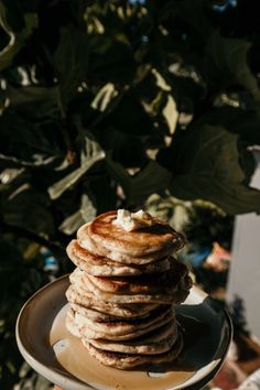 a stack of pancakes sitting on top of a plate