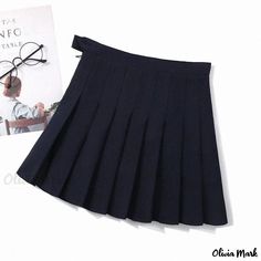 Olivia Mark - Half-Skirt Design for Women with High Waistline and Floral Accents Navy Pleated Skort, Navy Fitted Mini Pleated Skirt, Navy Pleated Mini Skirt, Fitted Navy Pleated Mini Skirt, Navy Skirt For School In Spring, Navy Skirted Skort With Lined Skirt, Navy Casual Pleated Skirt Skort, Fitted Navy Mini Skirt, Casual Navy Pleated Skort