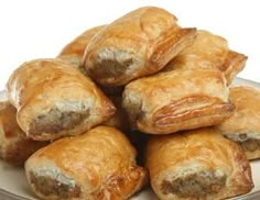 sausage rolls piled on top of each other with the words easy sausage rolls above them