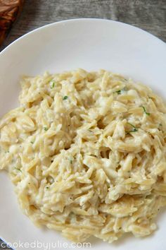 a white plate topped with macaroni and cheese