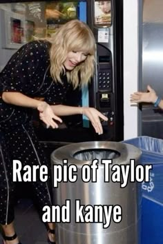 a woman reaching for something in front of a vending machine that says rare pic of taylor and kayye