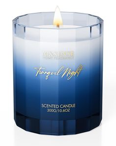 a candle that is blue and white with the words virgoul night on it