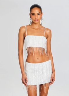 white sequin top, white crop top, sequin top, sequin crop top, sequin fringe top, white sequin fringe top, embellished top, beaded top,  statement top, Celebrity style, classy matching set, party outfit for women, party matching set, night out outfit, night out top, glam outfit, luxe fashion, bridal matching set, engagement party outfit, engagement matching set, wedding matching set, bachelorette outfit, bachelorette trip outfit, bachelorette trip matching set, , graduation outfit, grad outfit Glamorous Sleeveless Summer Sets, Glamorous Summer Sleeveless Set, Summer Evening Embellished Sets, Embellished Evening Sets For Summer, White Sequined Party Set, Summer Night Out Sequined Sets, Glamorous Sleeveless Party Set, White Mini Length Party Set, White Glamorous Evening Sets