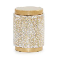 a gold and white canister with a lid on the top, sitting on a white surface