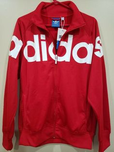 Vintage Adidas Jacket Color Red Size Large NWT. Condition is "New with tags". Shipped with USPS Priority Mail. Sporty University Red Outerwear For Fall, Red Outerwear For Sports In Fall, Red Track Jacket For Streetwear In Spring, Casual University Red Track Jacket For Winter, Red Track Jacket For Spring Streetwear, University Red Hooded Outerwear For Fall, Adidas Long Sleeve Winter Track Jacket, Adidas Winter Track Jacket Long Sleeve, Red Spring Track Jacket For Sports